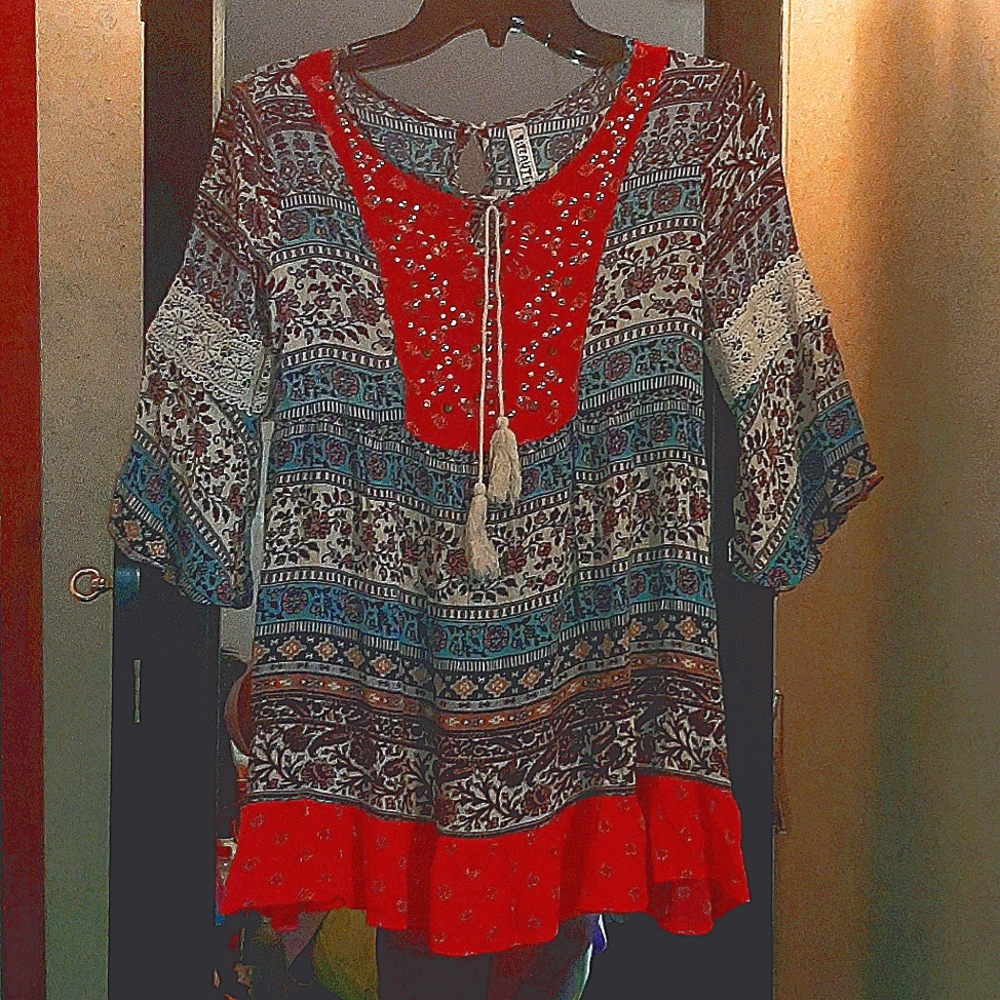 A beautiful bell sleeved dress.
